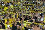 Supporters of Israeli football club Beitar Jerusalem cheer during a match in Jerusalem in 2015.