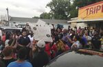 People protest after Alton Sterling, 37, was shot and killed during an altercation with two Baton Rouge police officers in Baton Rouge, Louisiana, on July 5. 