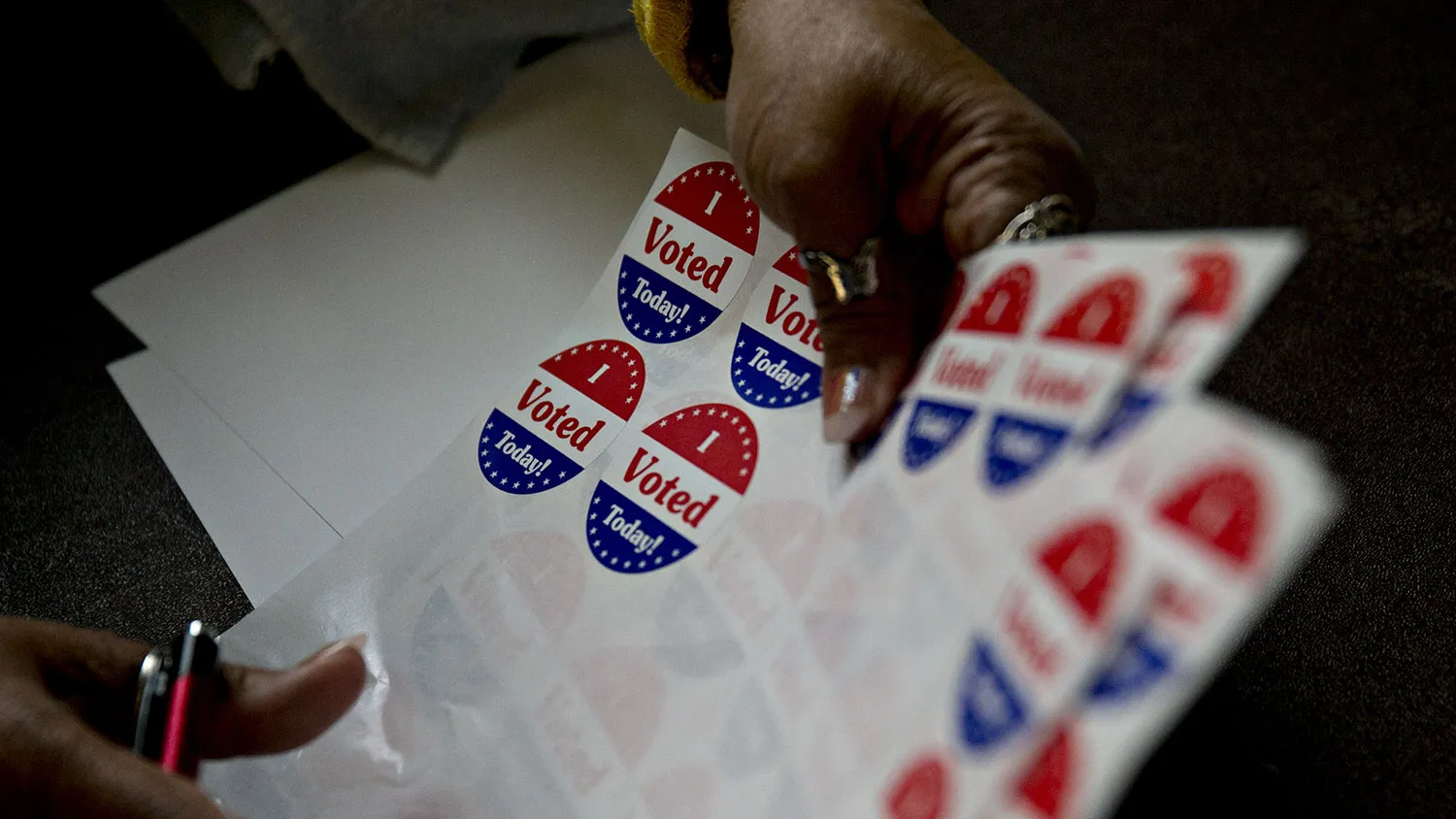 A poll worker organizes stickers in Philadelphia on April 26, 2016.
