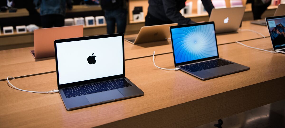 A Customer at an Apple Store Looking at His IPhone while Waiting at an Apple  Store Editorial Photo - Image of imac, computer: 237668441