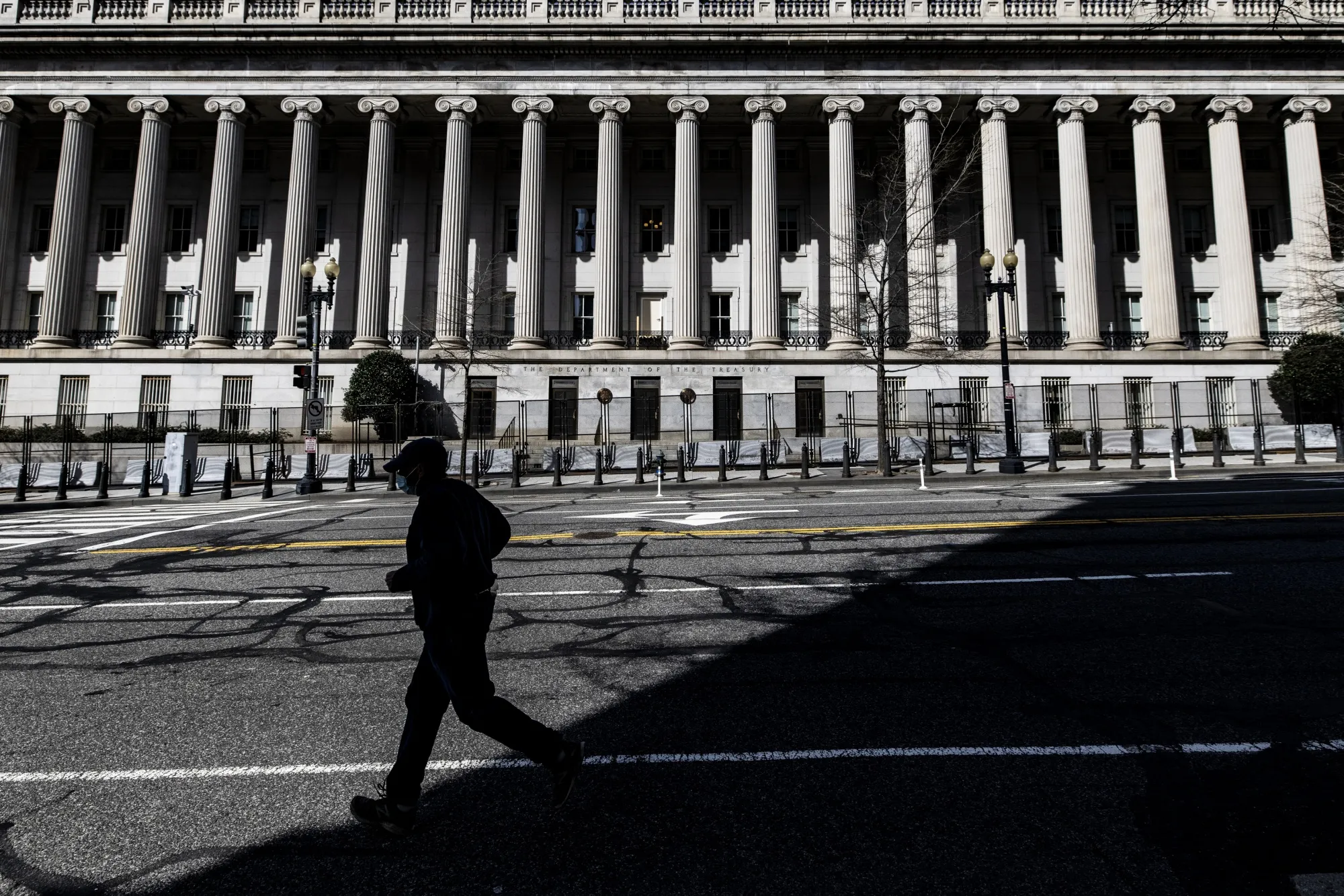 A pedestrians passes&nbsp;the US&nbsp;Treasury building in Washington.