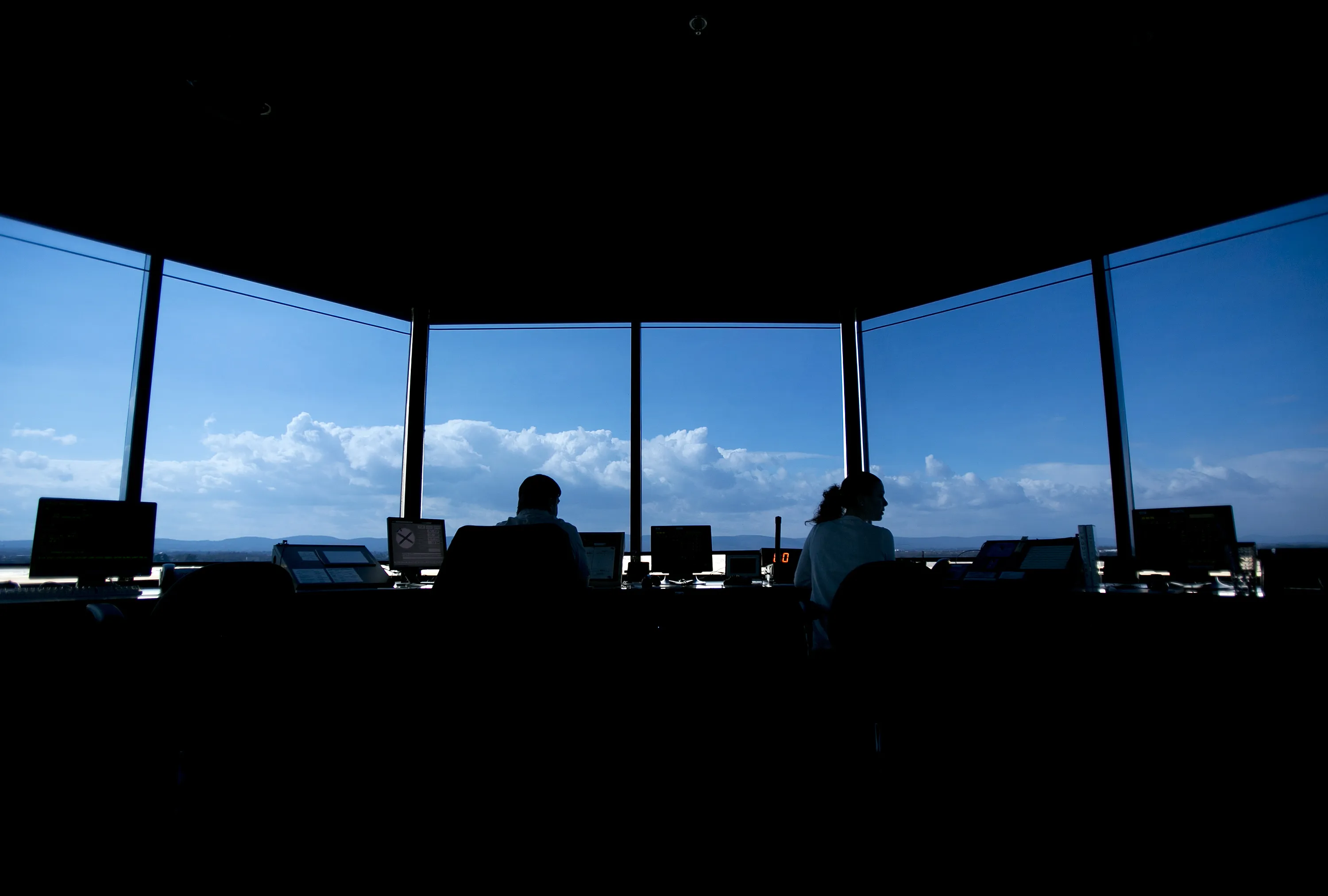 Air traffic controllers work at the Frederick Municipal Airport control tower in Frederick, Maryland.