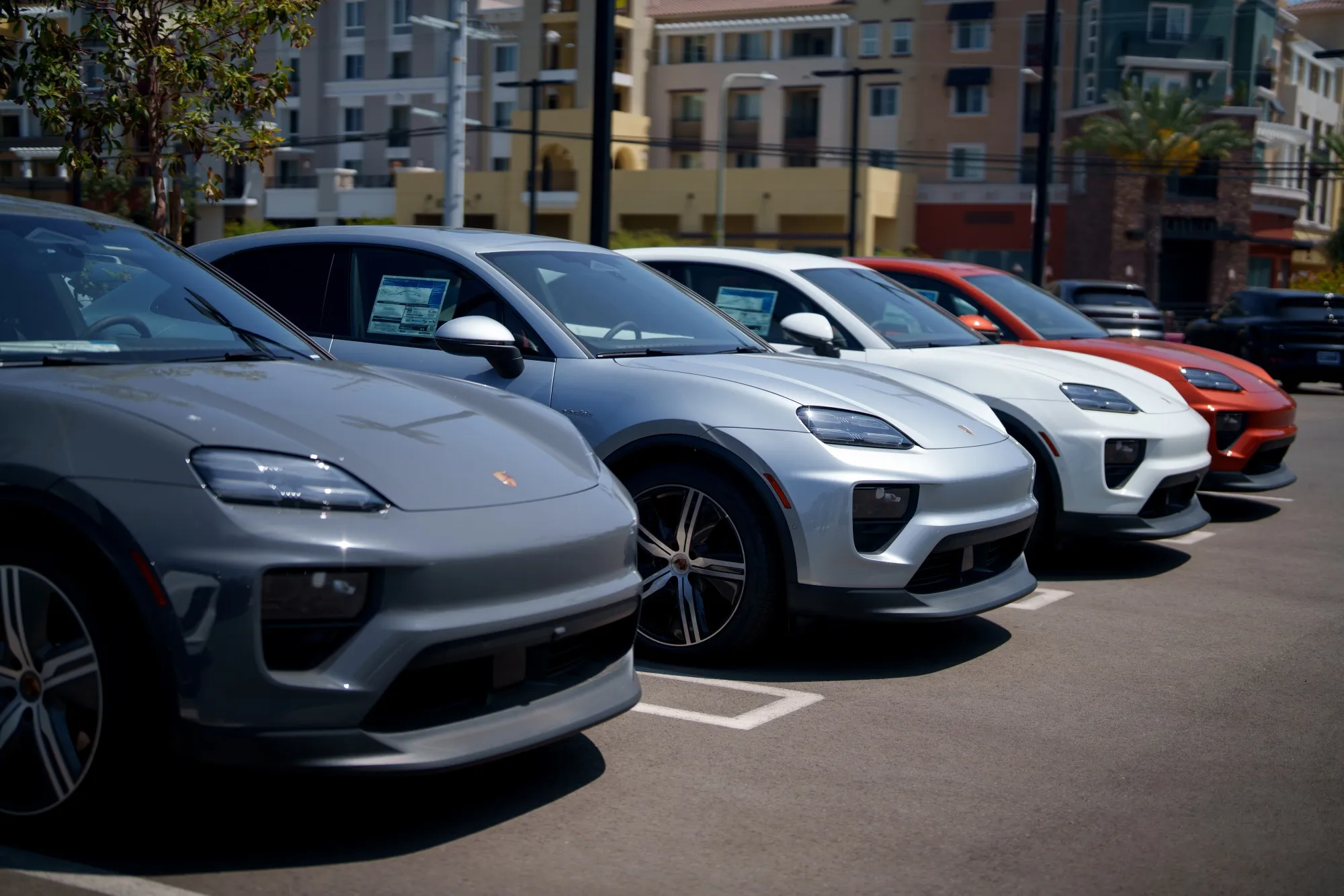Porsche vehicles for sale at a dealership in Los Angeles.