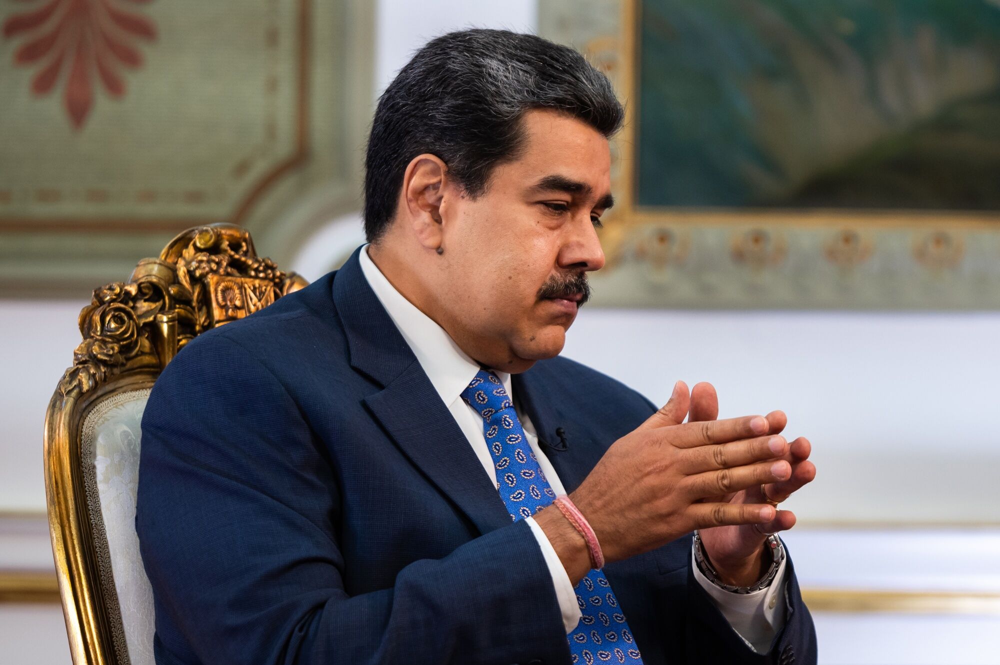 Nicolas Maduro listens during a Bloomberg Television interview in Caracas on June 14.