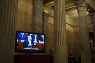 US President Barack Obama appears on a television monitor at the US Capitol as he delivers the State of the Union address in Washington, DC, January 20, 2015.
