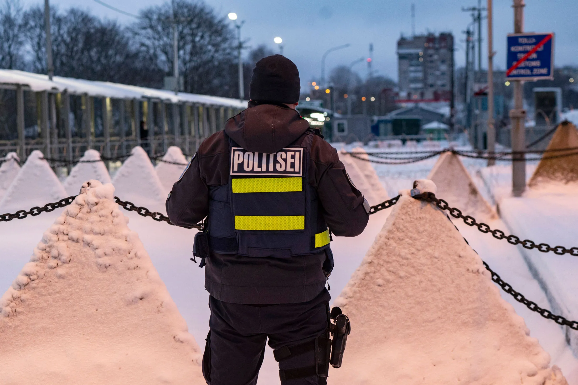 A police officer at the Estonia-Russia border in Narva, Estonia.