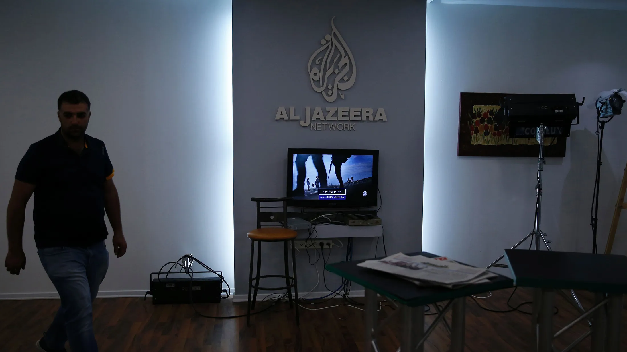 Employees of Qatar based news network and TV channel Al-Jazeera are seen at their Jerusalem office on July 31, 2017, Israel said on August 6, 2017 that it planned to close the offices of Al-Jazeera after Prime Minister Benjamin Netanyahu accused the Arab satellite news broadcaster of incitement. A statement from the communications ministry said it would demand the revocation of the credentials of journalists working for the channel and also cut its cable and satellite connections. / AFP PHOTO / AHMAD GHARABLI (Photo credit should read AHMAD GHARABLI/AFP/Getty Images)
