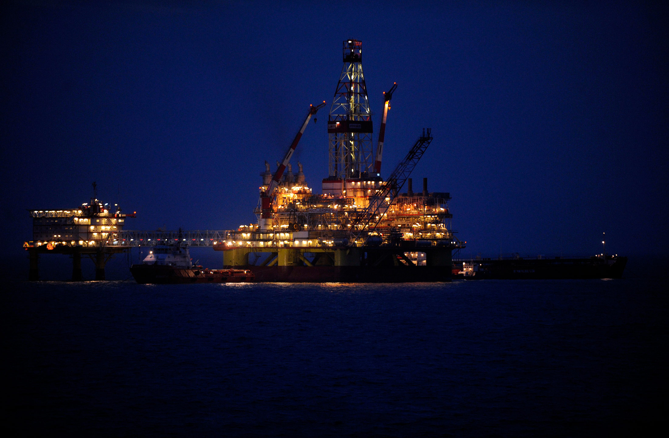 A picture taken on April 7, 2011 shows Russian LUKOIL ice-resistant fixed platform LSP-1, built at the Astrakhansky Korabel shipyard, intended to drill and operate wells and collect and pre-treat reservoir content at Korchagin's oil field in the Russian sector of the Caspian Sea some 180kms outside Astrakhan. The fields productivity of oil and gas condensate will peak at 2.3 million tonnes oil and 1.2 bcm gas per year. AFP PHOTO / MIKHAIL MORDASOV (Photo credit should read MIKHAIL MORDASOV/AFP via Getty Images)