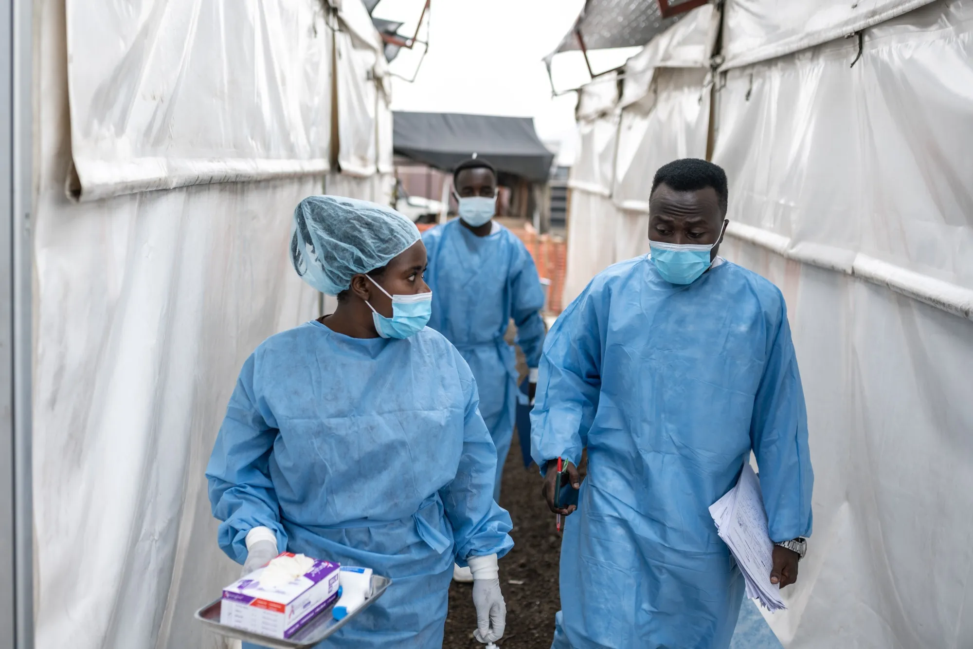 Health workers tour the treatment rooms at the Munigi mpox treatment center in North Kivu, Democratic Republic of Congo.