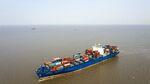 The Emirates Hana container ship sails near the Yangshan Deepwater Port, Shanghai, China.