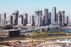 This 2012 photo shows modern office buildings under construction in the city of Tianjin’s replica of Manhattan, which remains unoccupied.

