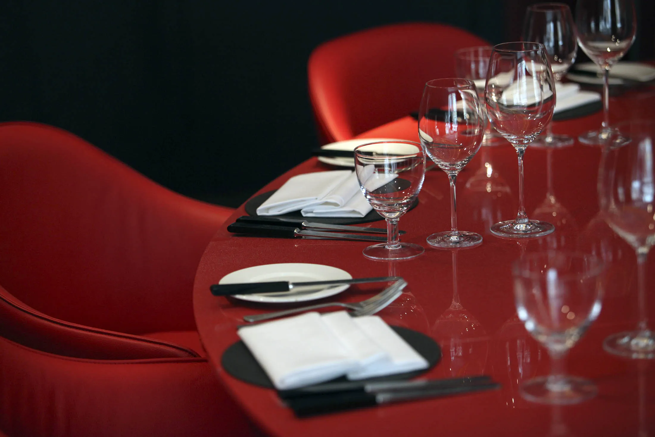 Cutlery and glasses are seen in a private dining room at D&amp;D London Ltd's South Place hotel in London, U.K., on Thursday, Sept. 13, 2012. London hotels' average room rates rose 87 percent for the Olympic Games and hoteliers reported a slight occupancy increase, according to data compiled by hotel industry researcher STR Global.
