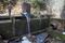 Atkins surveys the weak waterflow at privately owned Tunnel Hill Hydro. A handful of hydro-operators that largely rely on snowmelt to generate hydro power in the early months of summer in California will experienced dramatic declines in revenue this year, thanks to low rainfall levels and a drastically reduced snowpack.