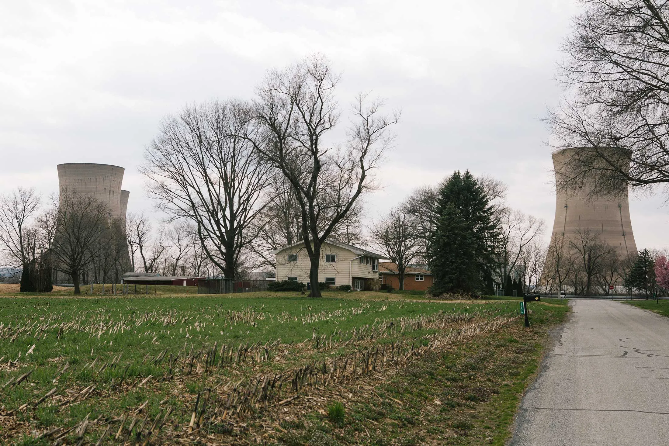 The cooling towers at the Three Mile Island nuclear power plant loom over Pennsylvania’s Londonderry Township&nbsp;on April 11, 2018.