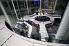 Employees work on the trading floor of the Tokyo Stock Exchange in Tokyo, Japan, on Monday, Dec. 24, 2013. Asian stocks rose, with Japan's Nikkei 225 Stock Average topping 16,000 for the first time since 2007, amid optimism U.S. economic growth is accelerating.