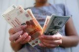 Russian Currency Exchanges As Ruble Falls To Record Low