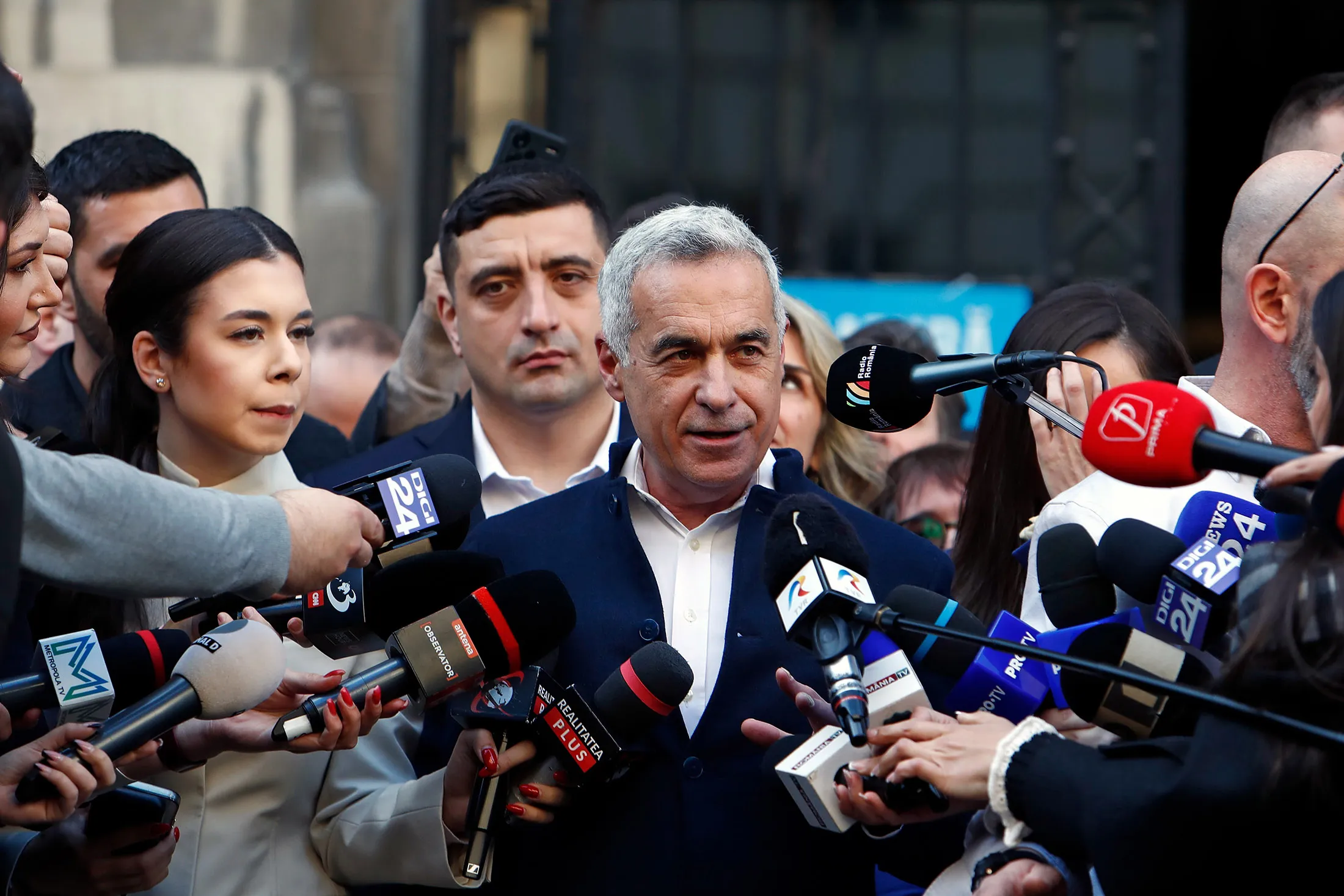 Calin Georgescu addresses the media after registering his candidacy for presidential election at the Central Electoral Bureau in Bucharest, Romania, on March 7.