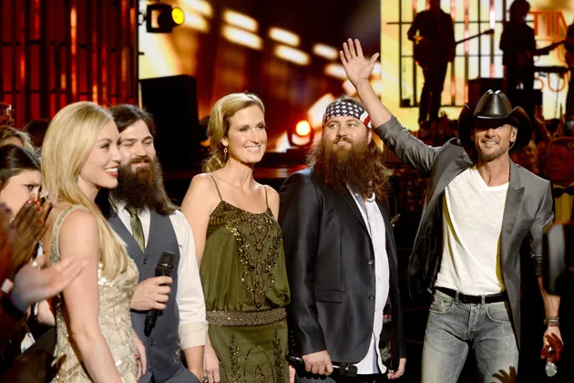 From left: Jessica Robertson, Jep Robertson, Korie Robertson and Willie Robertson of A&amp;E TV's Duck Dynasty with Tim McGraw