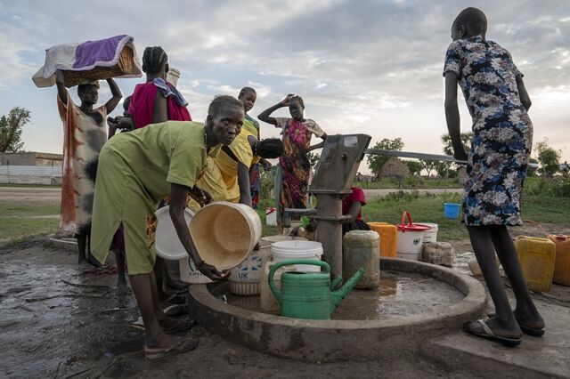 Women collect water at a borehole outside the health ministry in Koch town. The entire county's 191,000 residents have a mere 146 bore holes for clean water, of which only 86 are functional, according to James Tut, Koch County's Health Director. 