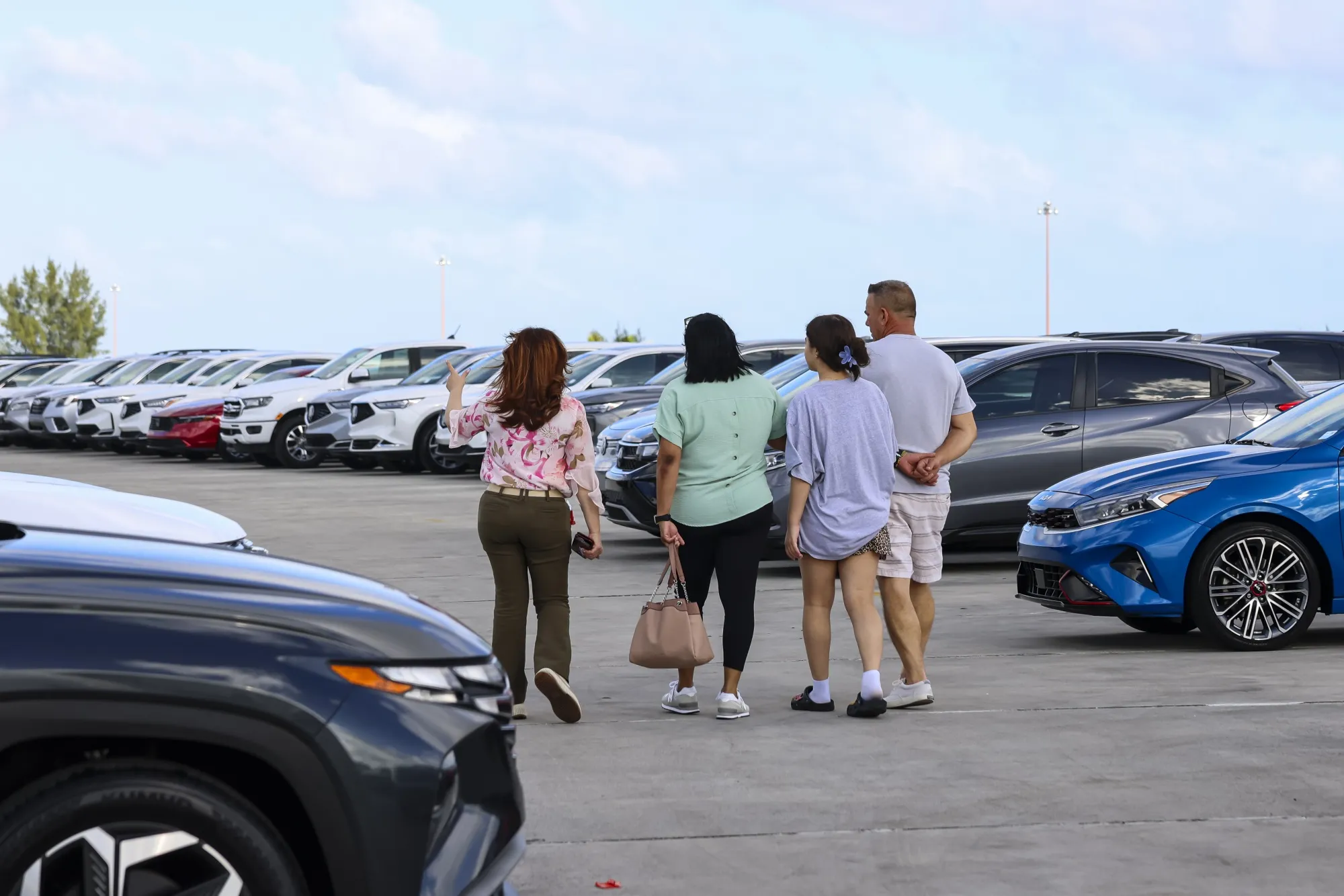 Customers look for a new vehicle to purchase at a Volkswagen&nbsp;dealership in Miami, Florida.