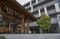 The Akagi shrine, left, stands next to a residential building in Tokyo, Japan, on Monday, April 10, 2017. Photographer: Shiho Fukada/Bloomberg