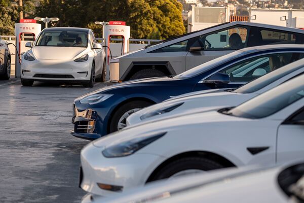 Tesla vehicles at supercharging stations in San Francisco