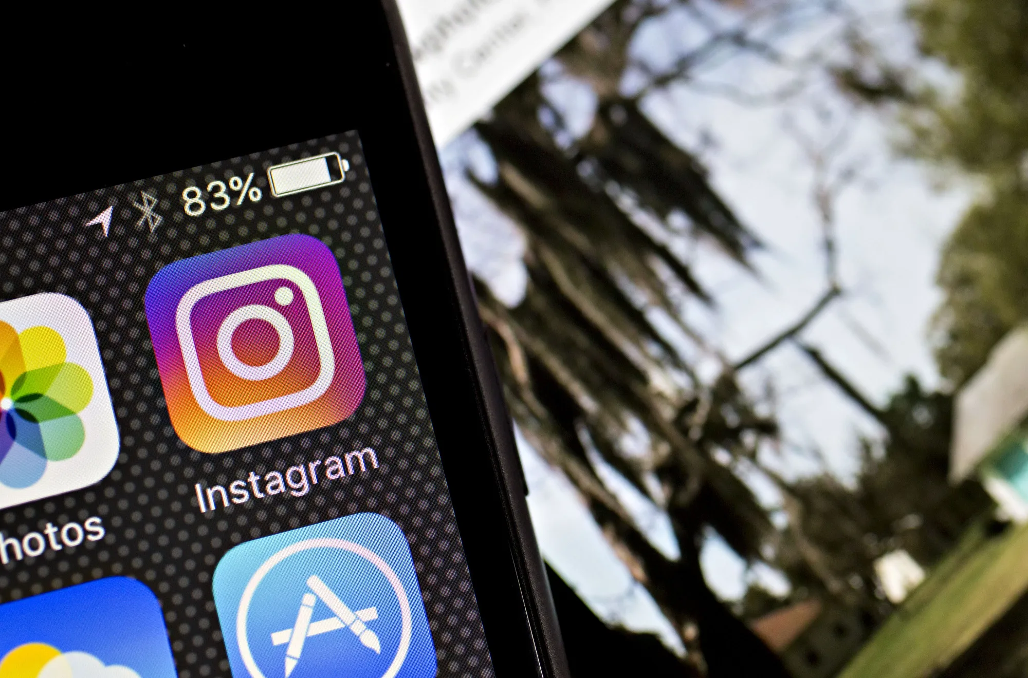 Facebook Inc.'s Instagram logo is displayed on an Apple Inc. iPhone in this arranged photograph taken in Washington, D.C., U.S.
