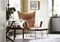 A wing chair by Carl Hansen & Søn offers a comfortable, but modern, relaxation spot.