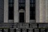 Federal Reserve police officers stand outside the Marriner S. Eccles building in Washington, D.C., U.S., on Monday, April 8, 2019. The Federal Reserve Board today is considering new rules governing the oversight of foreign banks. Chairman Jerome Powell said the Fed wants foreign lenders treated similarly to U.S. banks.
