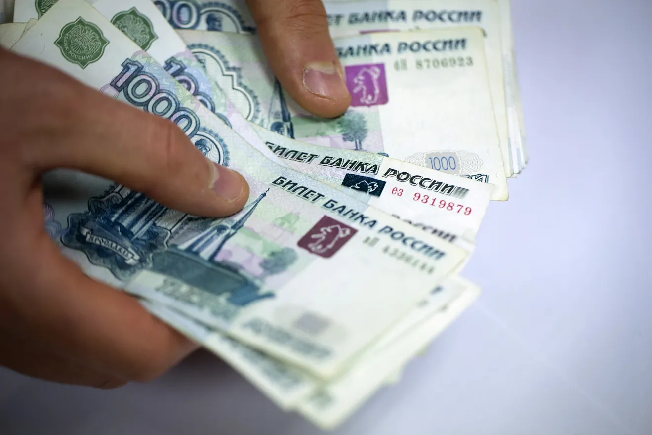 Ukrainian Hryvnia And Russian Ruble Currency Banknotes As Ukraine Tensions Rise