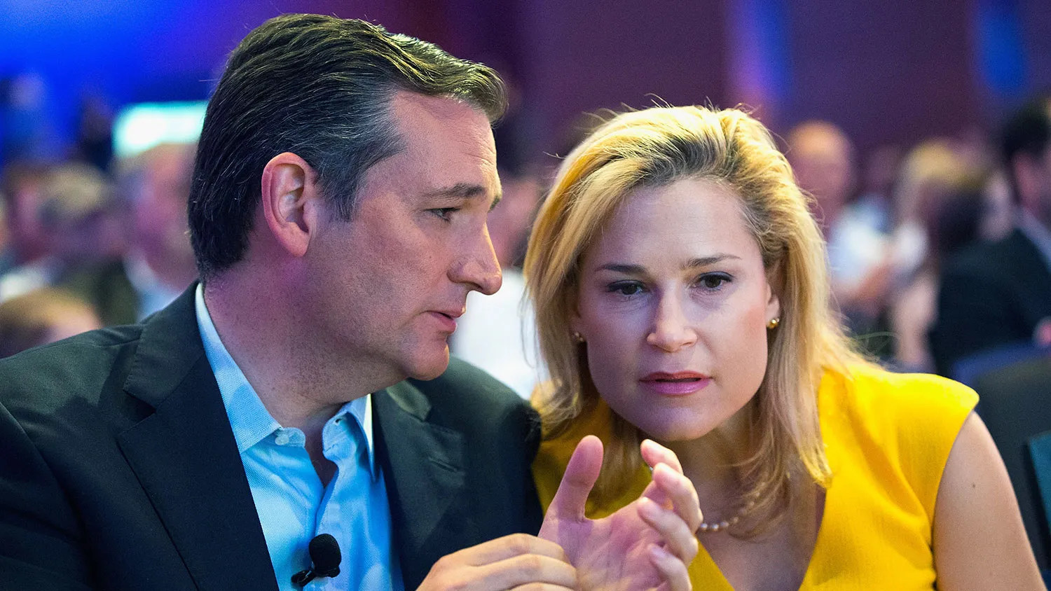 Republican presidential candidate Ted Cruz sits with his wife, Heidi Nelson Cruz, at a rally on Aug. 21, 2015, in Des Moines, Iowa.
