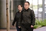 Hao Zhang,&nbsp;right, arrives at federal court in San Jose, Calif., on Oct. 2, 2019.