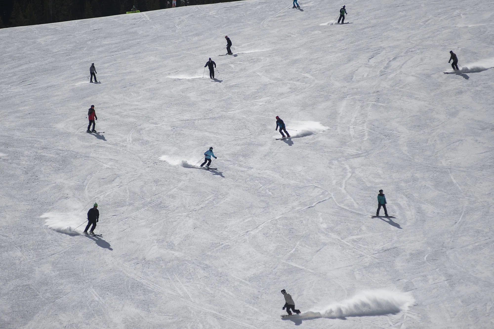 Skiers come down the mountain at a Vail Resorts Inc. location in Vail, Colorado.