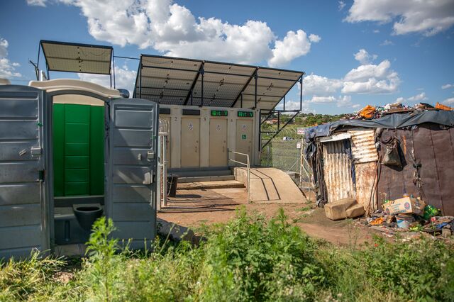 The Clear Enviro Loo Recirculation Water Treatment Plant, powered by solar panels, protected by security guards and serviced by janitors, serves as toilets for the community of the Mofolo North informal settlement in Soweto, South Africa. These toilets replaced the chemical porta toilets that everyone once had to use.