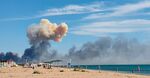 Smoke seen from the beach at Saky after explosions were heard from the direction of a Russian military airbase near Novofedorivka, Crimea, on Aug. 9.