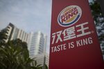 An advertisement for Burger King stands in the Zhujiang New Town district of Guangzhou.