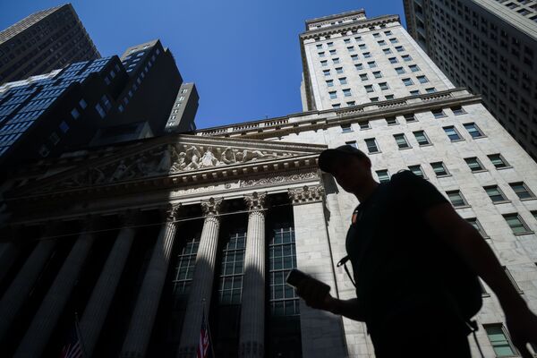 Traders At The NYSE As Stocks Hold Near Record Before Key Inflation Data