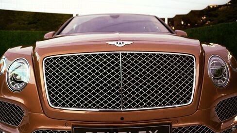 The Bentayga incorporates a bold front diamond matrix grill and suspended round halogen headlights.