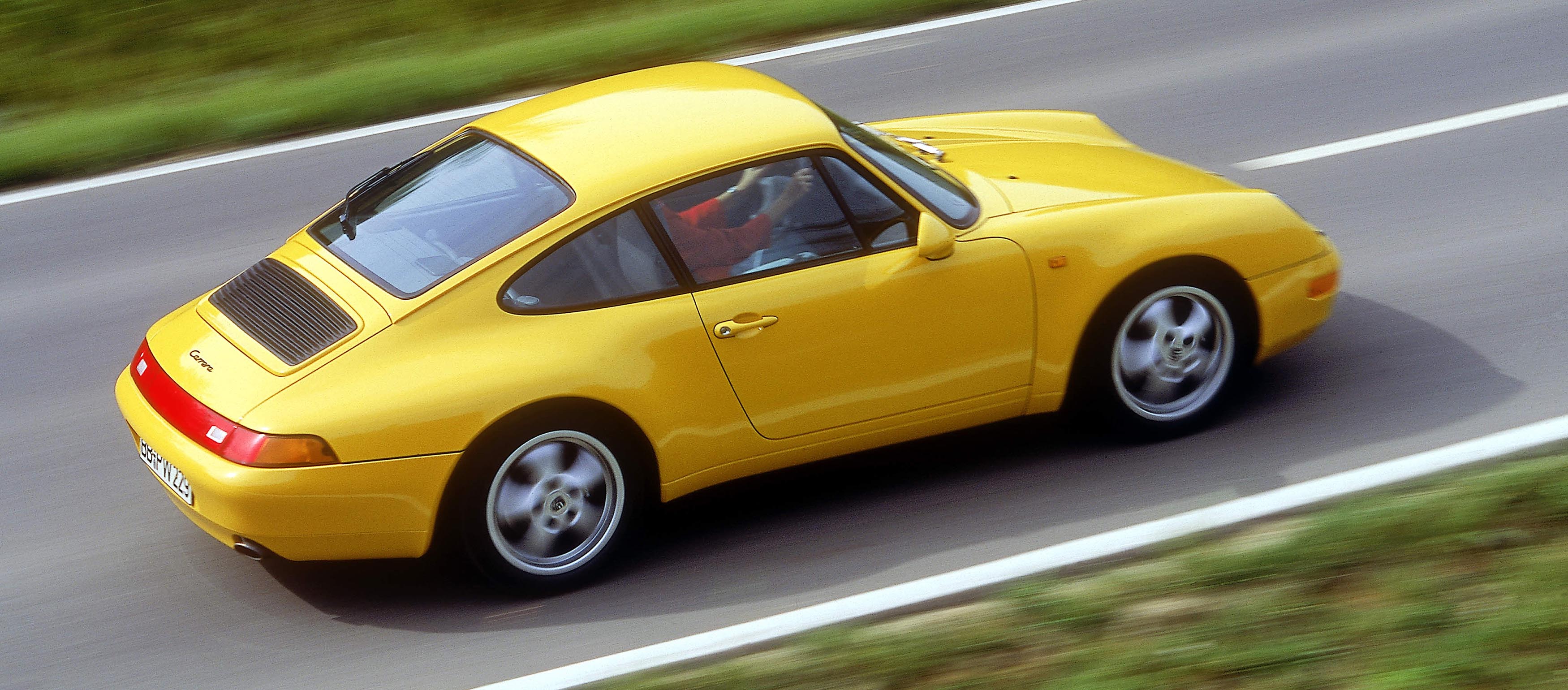 Mighty, Cute: The Colorful History of the Best-Selling Porsche 911 -  Bloomberg