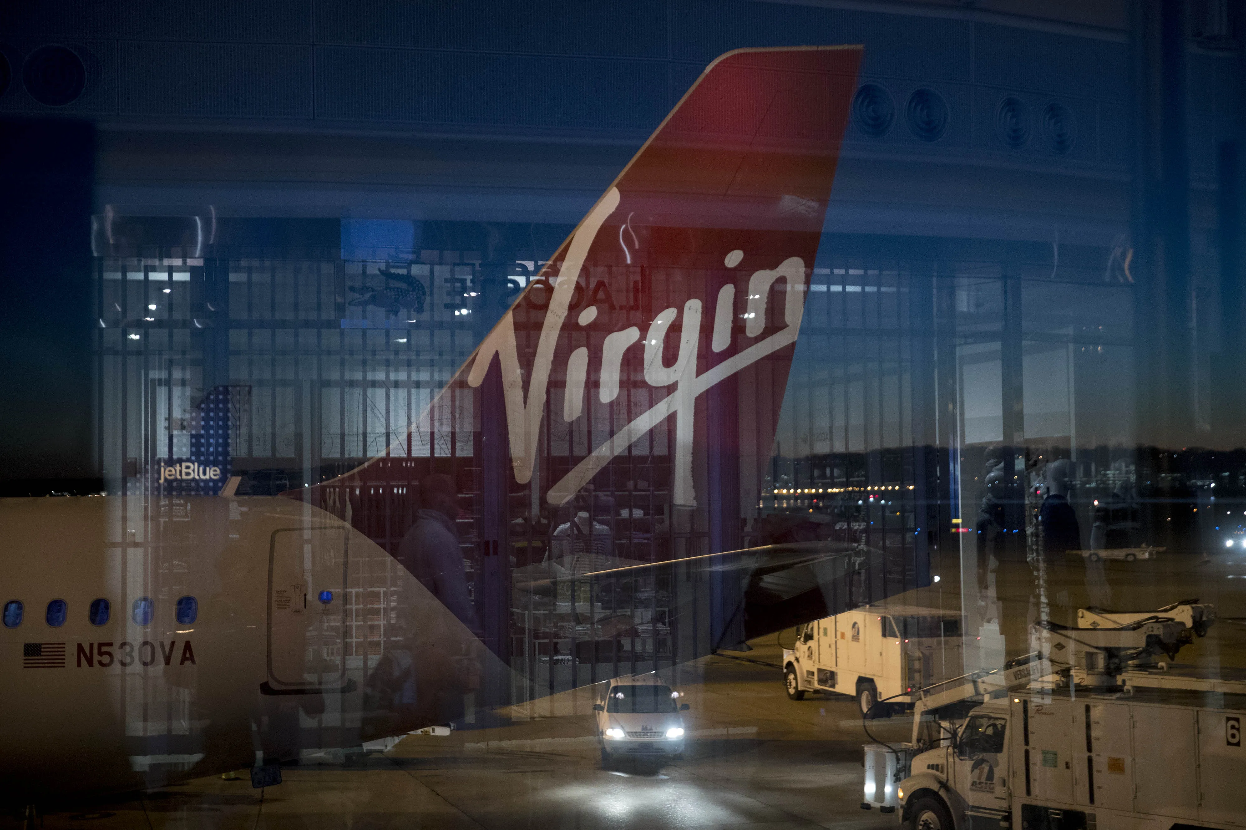 Travelers At Ronald Reagan Airport Ahead Of Thanksgiving Holiday