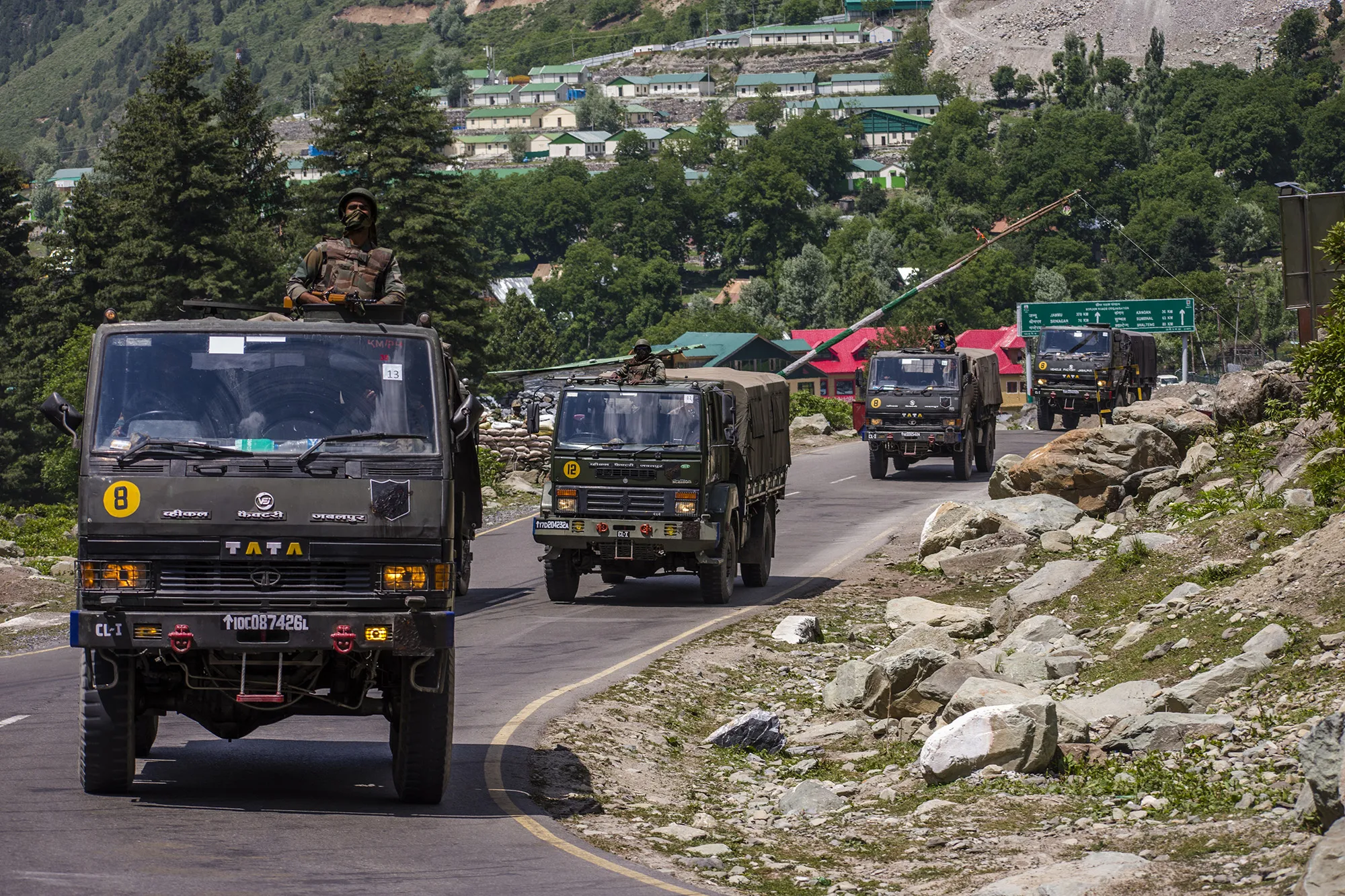 An Indian army convoy drives towards Leh, on a highway bordering China in Gagangir, India.&nbsp;