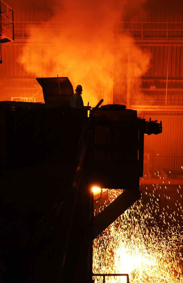 An electric arc furnace can produce recycled steel from scrap metal.