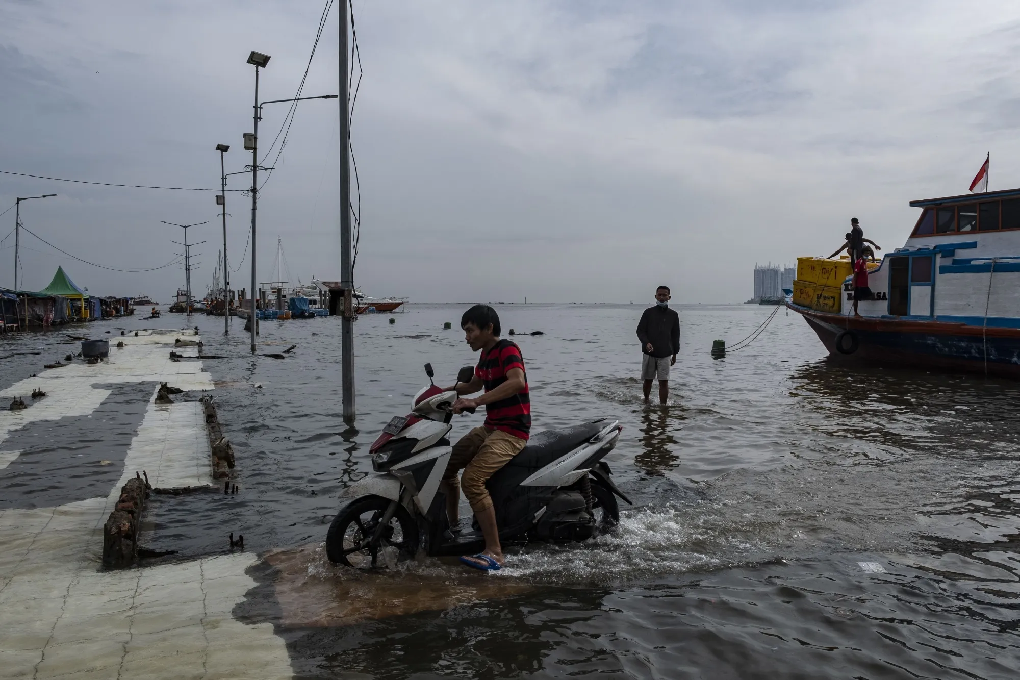 A ferry terminal on the North coast of Jakarta which is flooded during high tide in 2021.