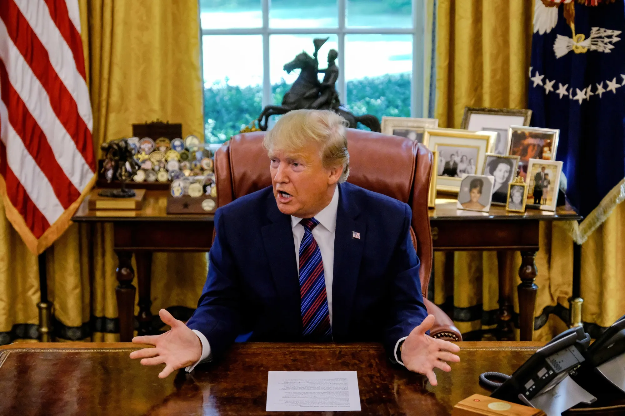 Trump speaks to members of the media in the Oval Office on&nbsp;July 26.&nbsp;