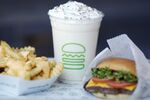 A ShackBurger, cheese fries, and milkshake are arranged for a photograph at a Shake Shack Inc. restaurant in Lexington, Kentucky, U.S.