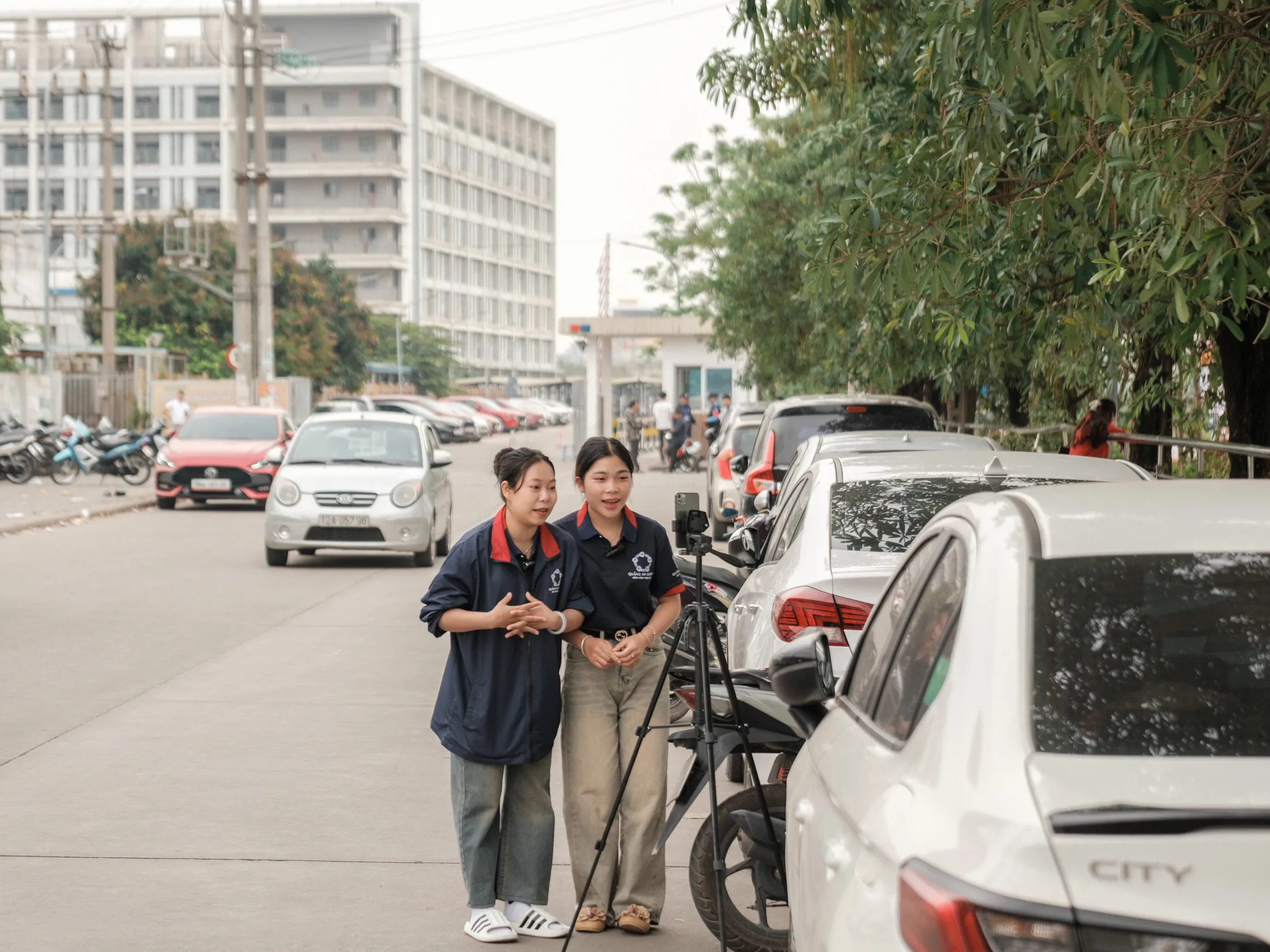 Recruiters live-stream on TikTok outside a Foxconn Technology Group factory in Bac Ninh in March.