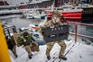 Danish soldiers disembark in Nuuk, Greenland, on Jan. 18.