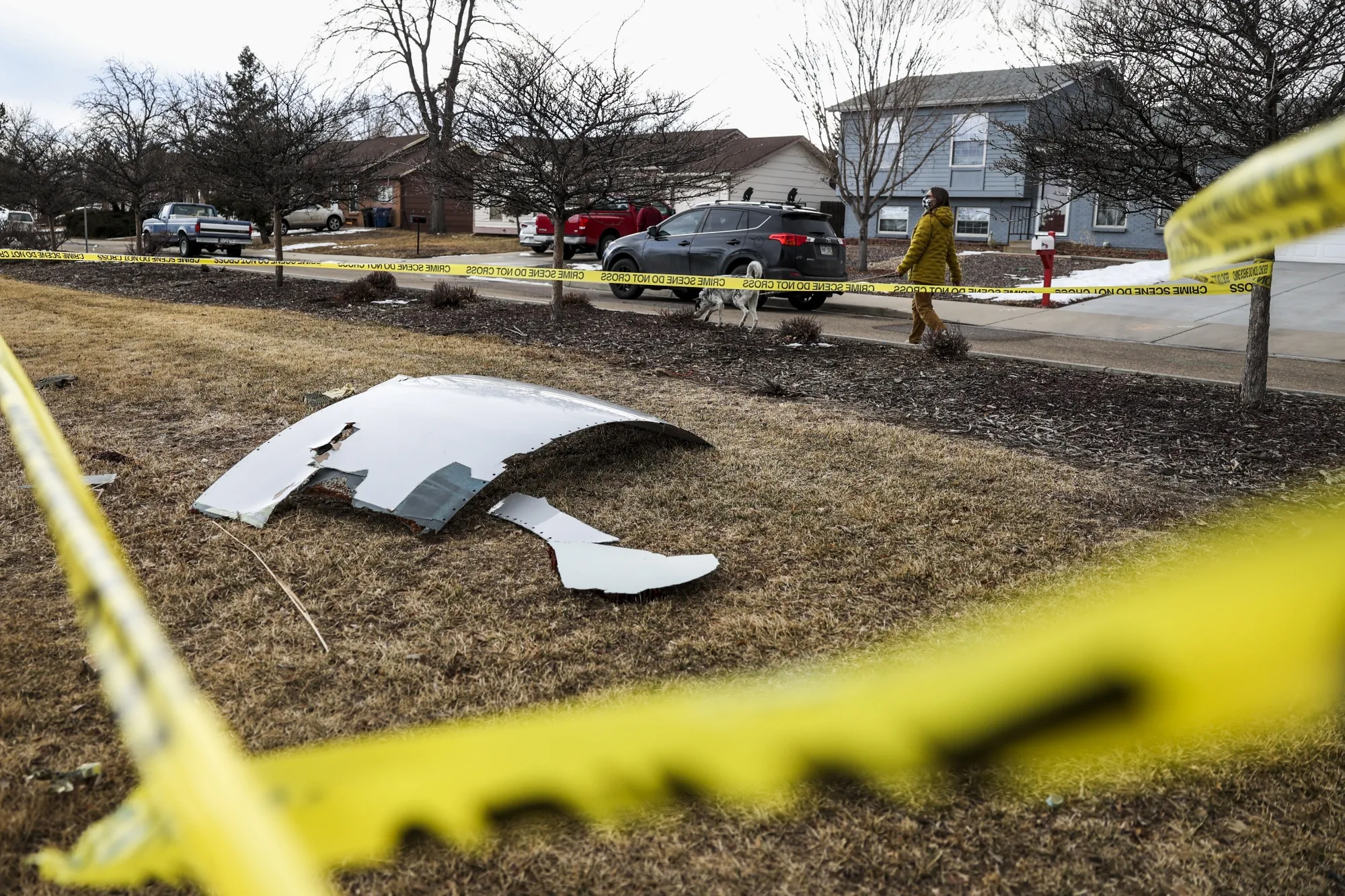 Pieces of an airplane engine from Flight 328 scattered in a Colorado neighborhood on Feb. 20.