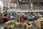 Employees pack orders at&nbsp;Alibaba’s logistics arm Cainiao in Wuxi&nbsp;ahead of the Singles' Day shopping extravaganza this year.