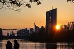 The European Central Bank (ECB) headquarters, right, and skyscrapers near the River Rhine at sunset in the financial district in Frankfurt, Germany, on Tuesday, April 20, 2021. Financial markets around the world are waking up to the risks of another coronavirus flare-up. Photographer: Alex Kraus/Bloomberg